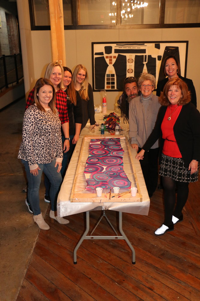 Members of the Wear Red for Women committee have custom painted 33 silk scarves that will be available for auction at the committee’s fourth annual luncheon on Feb. 24 at The Foundry. Tickets will be available in January. From left, Hannah Sartin; Dianne Simon, committee cochair; Jennifer Owen; Lauren Thiel-Payne, foundation executive director; Don Luper, SFCC art instructor and Vicki Weaver, Daum Museum education curator, who both provided artistic support during three painting sessions; Allison Brosch; and Lori Wightman, committee co-chair.